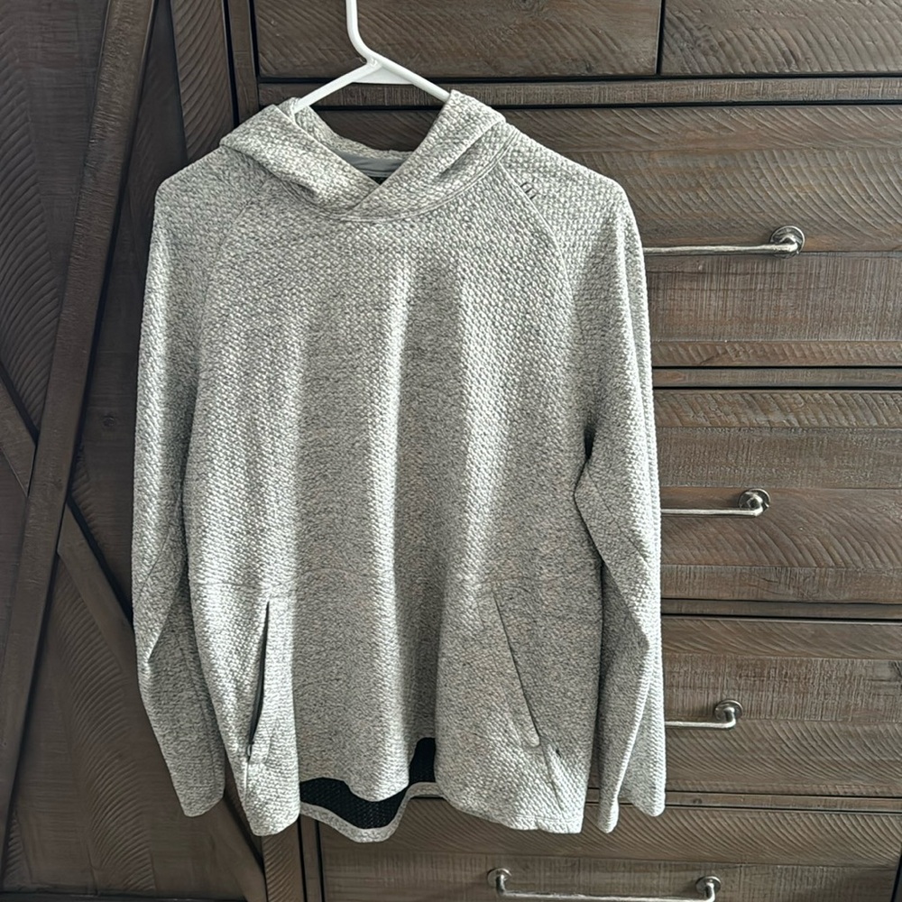 Lululemon pull over hoodie in gray and white. Size is large.
